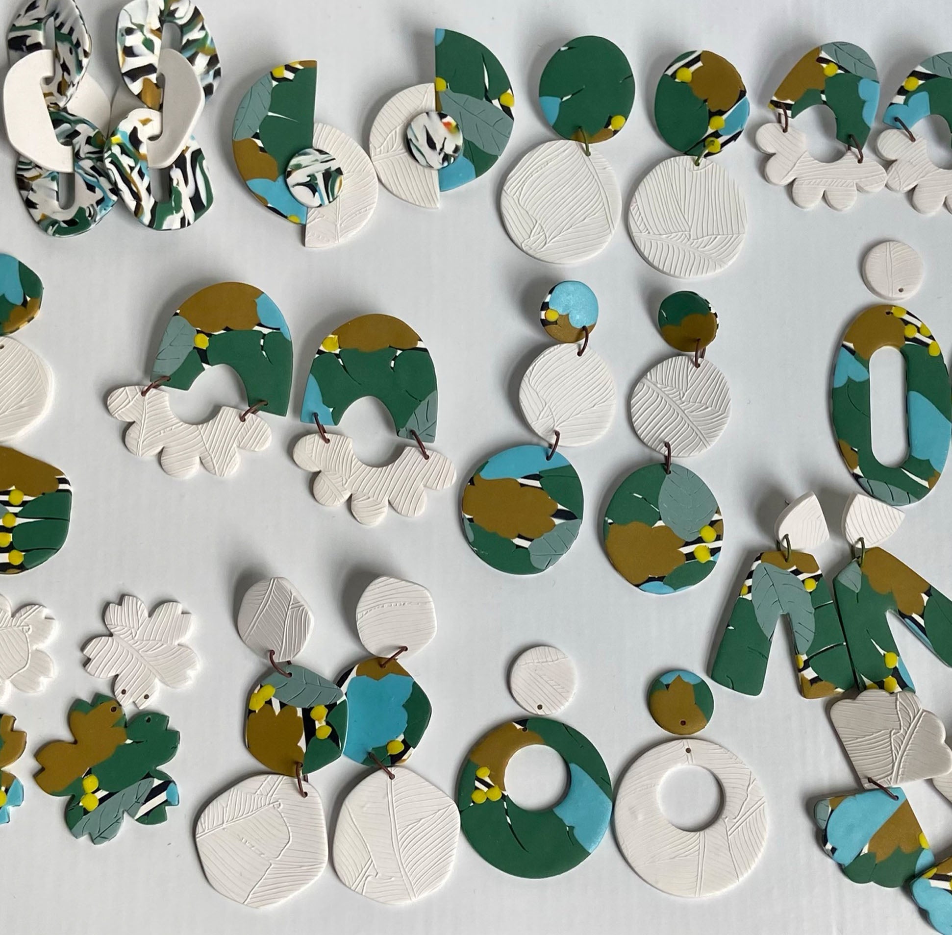 Okavango Collection from Uju Lwami Creations. Experience the lush greens, earthy yellows, blue skies and shimmering fluffy clouds of this abstract ode to the Okavango. Buttery smooth, subtly shimmering and elegant.