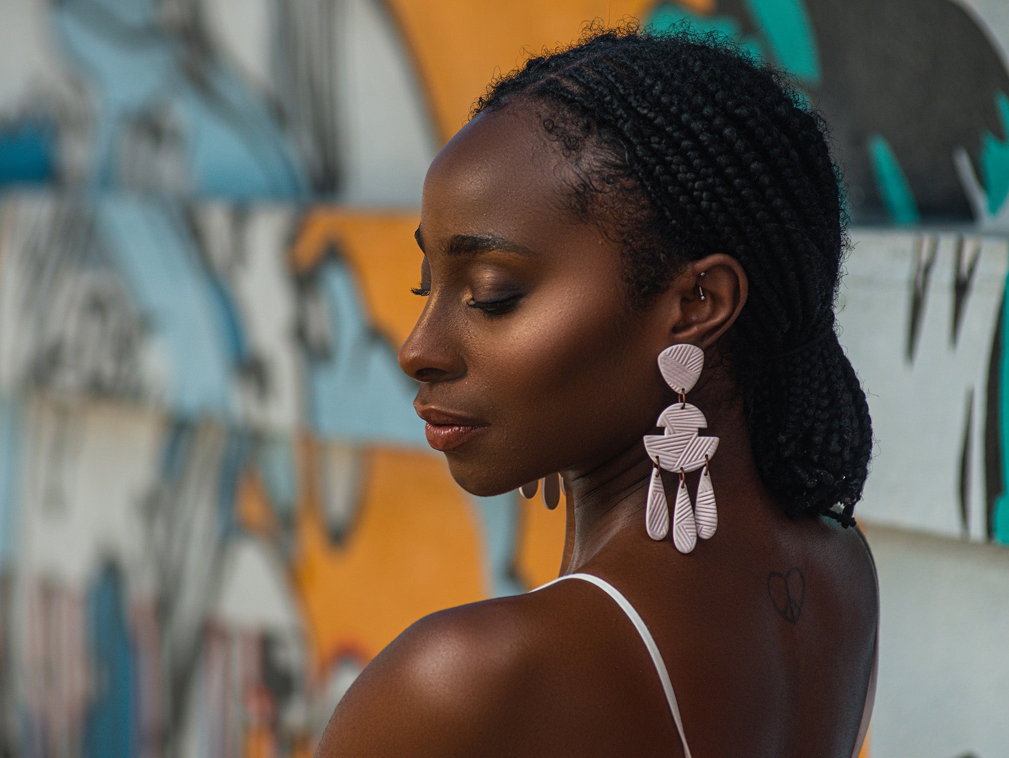 Uju Lwami earrings on a model - Hero image